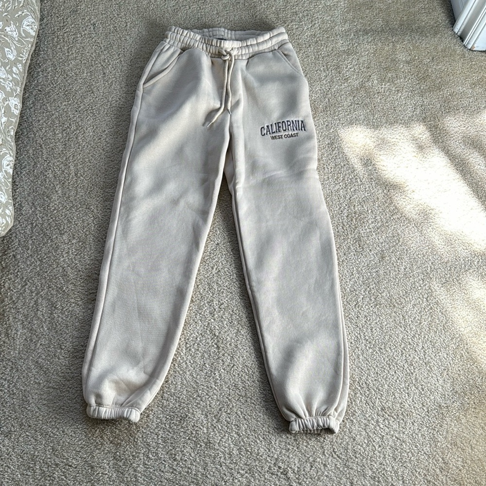 Cream sweatpants “California West Coast”